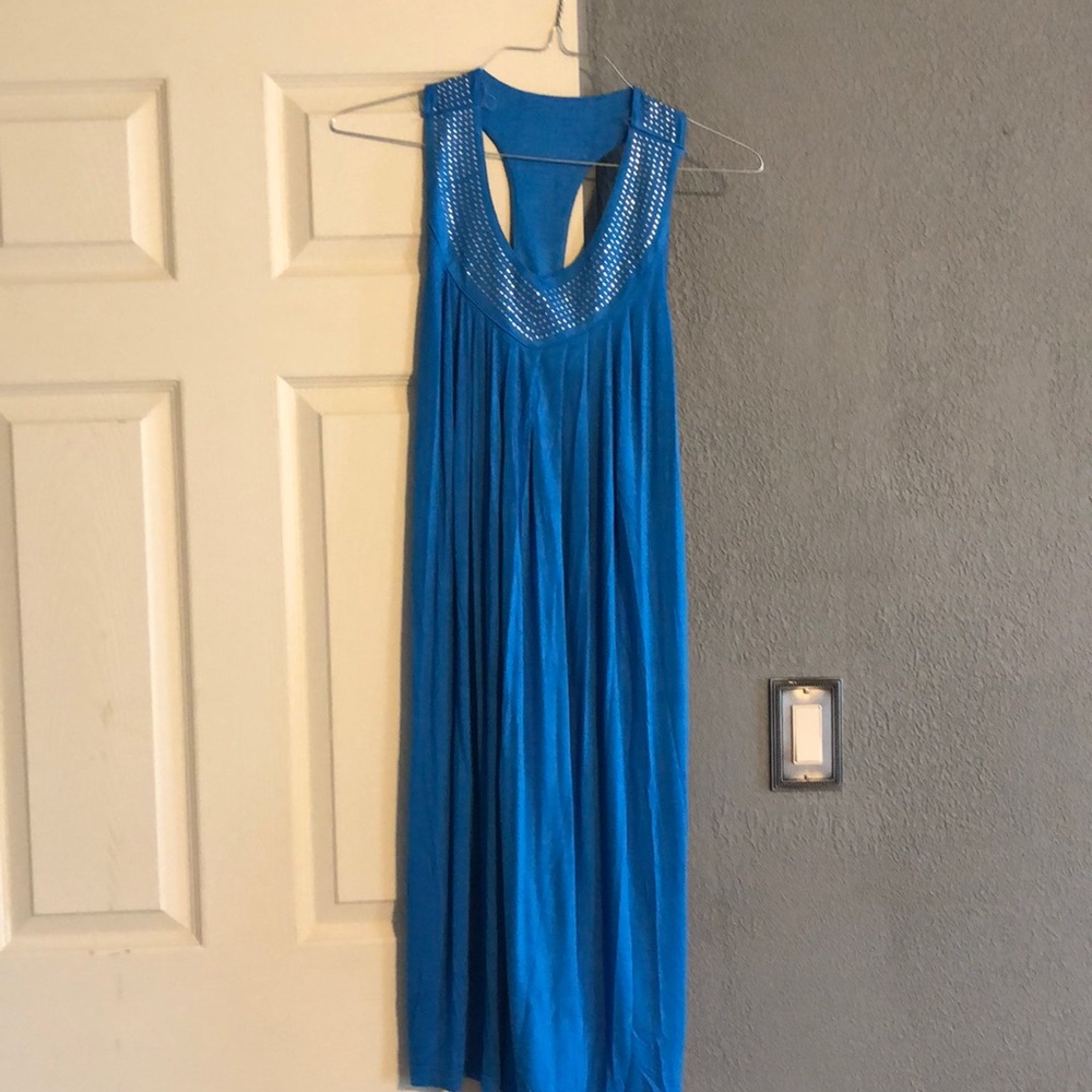 Never been worn. Blue beach dress.